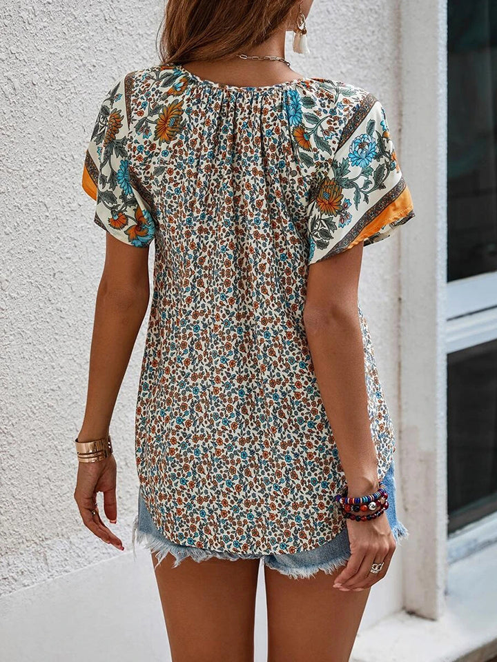 Printed Short Sleeve Tie Neck Blouse